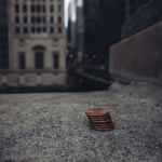 coins on concrete in downtown