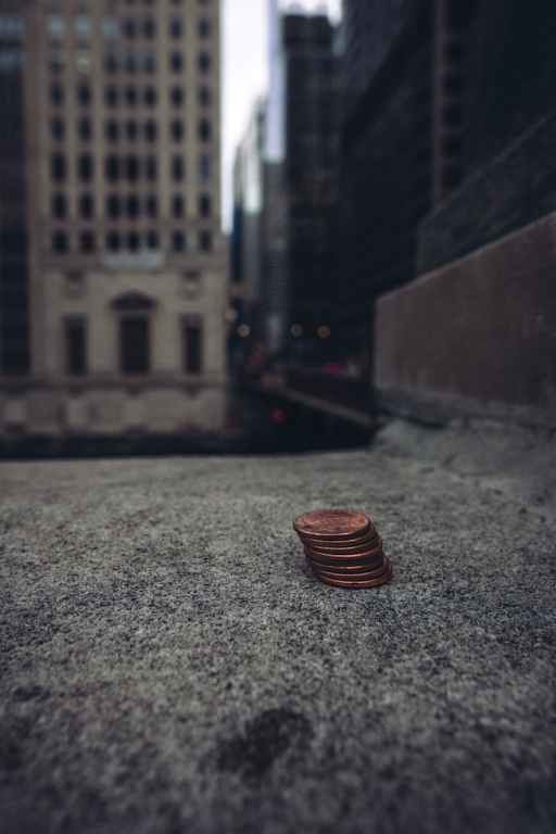 coins on concrete in downtown